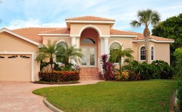 Upscale house with luxurious tropical landscaping